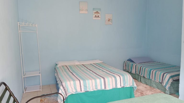 3 beds in room 17 at Ifafa Beach Hotel 768x432